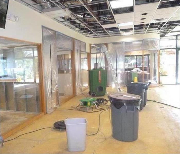 Local Retail Store with Water Damage from Sprinkler system